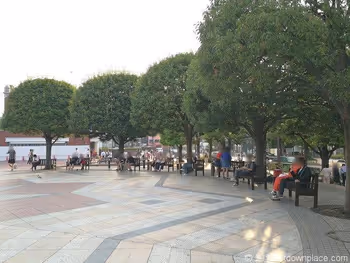 Seating rest area at the clock tower plaza of Ebisu Garden Place