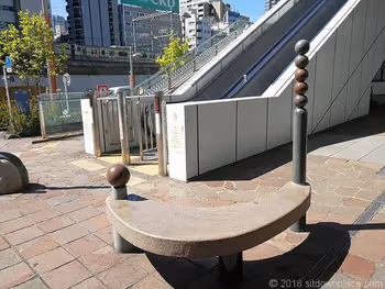 Bench next to the escalator at the Shiodome Building Traffic Square
