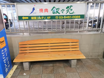 Benches in the rest area in front of the Kyodo Station ticket gate