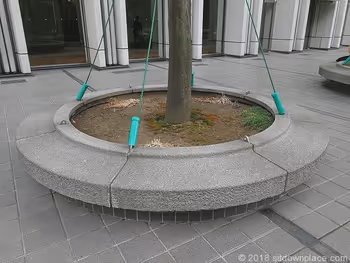 Circular stone benches of Shinjuku Nomura Building